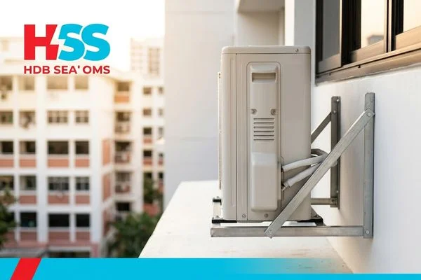 Outdoor compressor unit properly mounted on HDB aircon ledge in Singapore